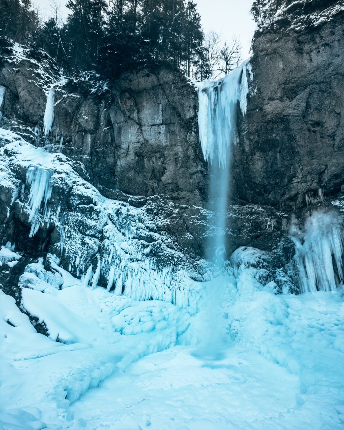Frozen Waterfall in Appenzell, Switzerland called Leuenfall. Accesible with a hike or short walk.